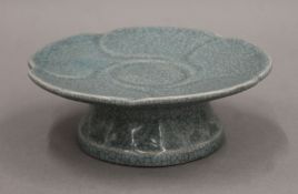 A Chinese Ru Ware style lotus pale blue crackle glazed footed dish,