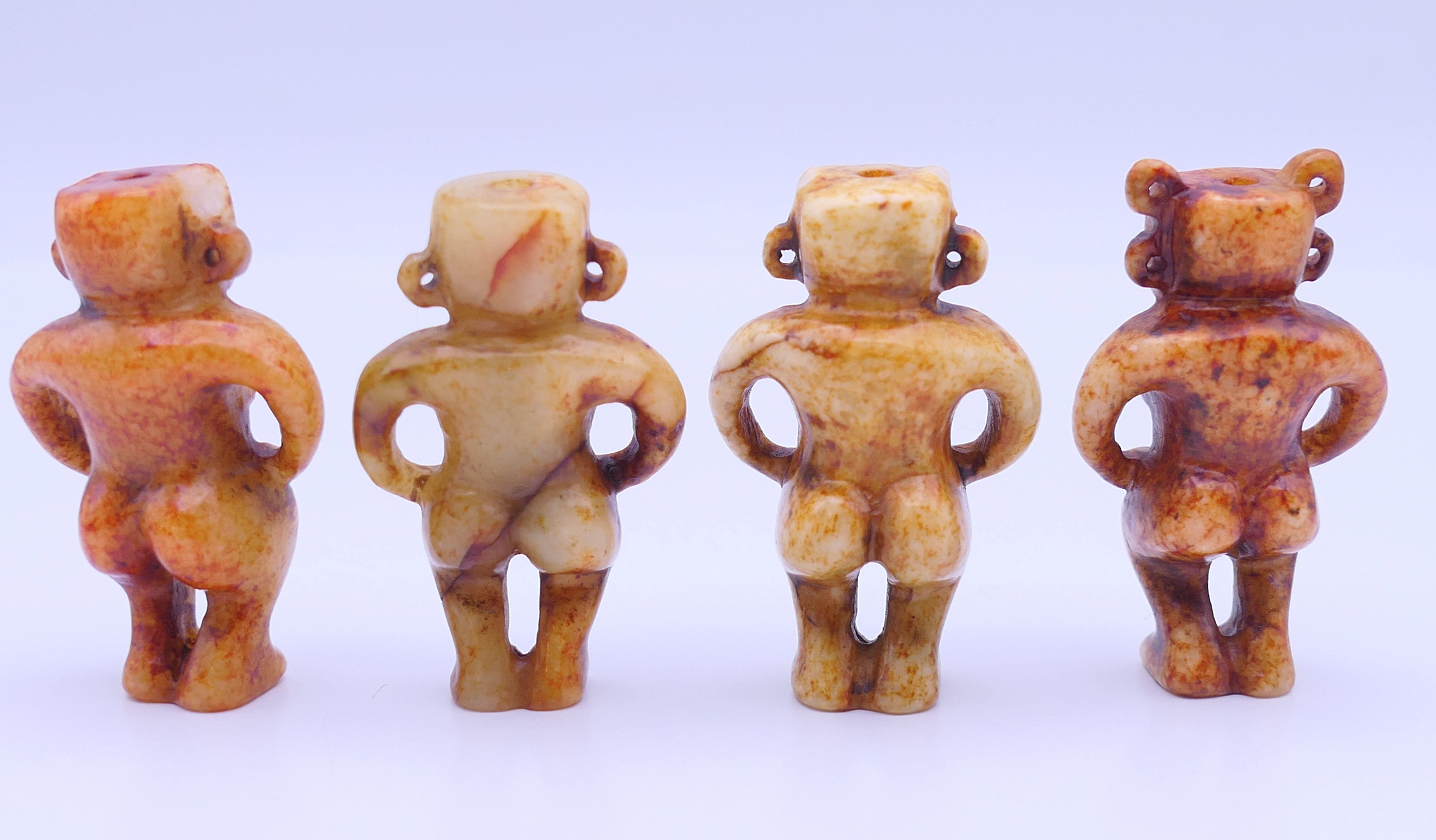 Nine Chinese fertility beads (seven male and two female), Han Dynasty. Each approximately 4 cm high. - Image 13 of 17