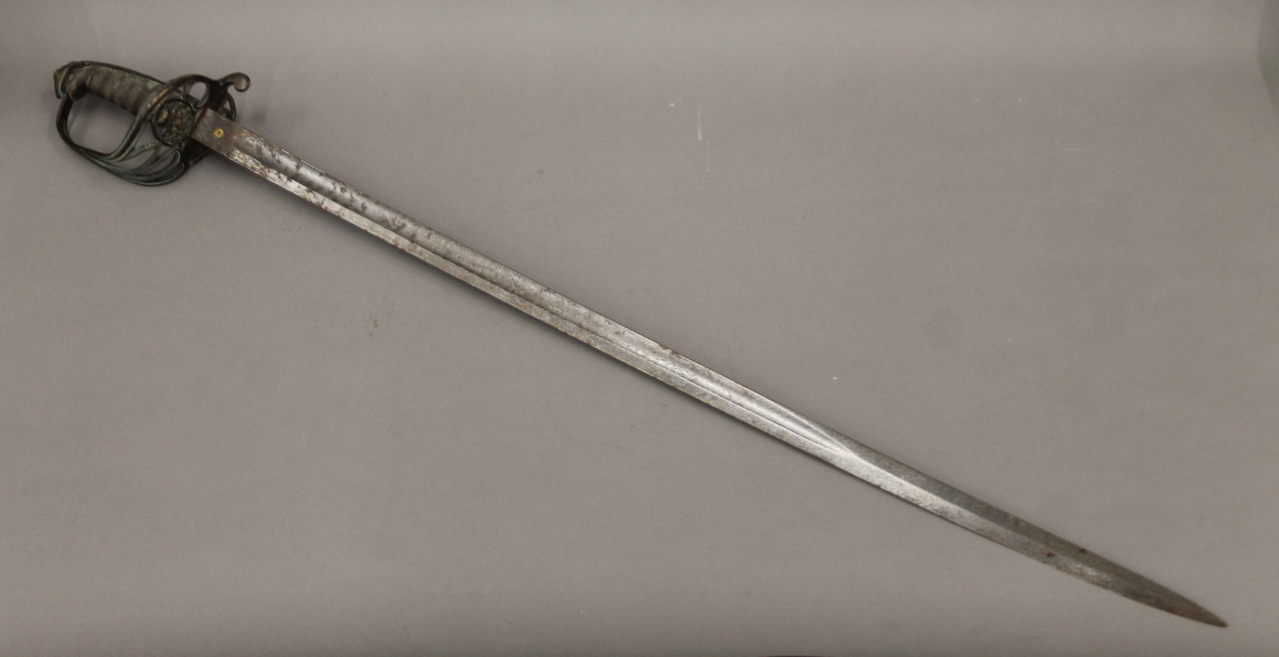 A Victorian Henry Wilkinson Service sword in scabbard. 102 cm long. - Image 4 of 11