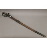 A Victorian Henry Wilkinson Service sword in scabbard. 102 cm long.