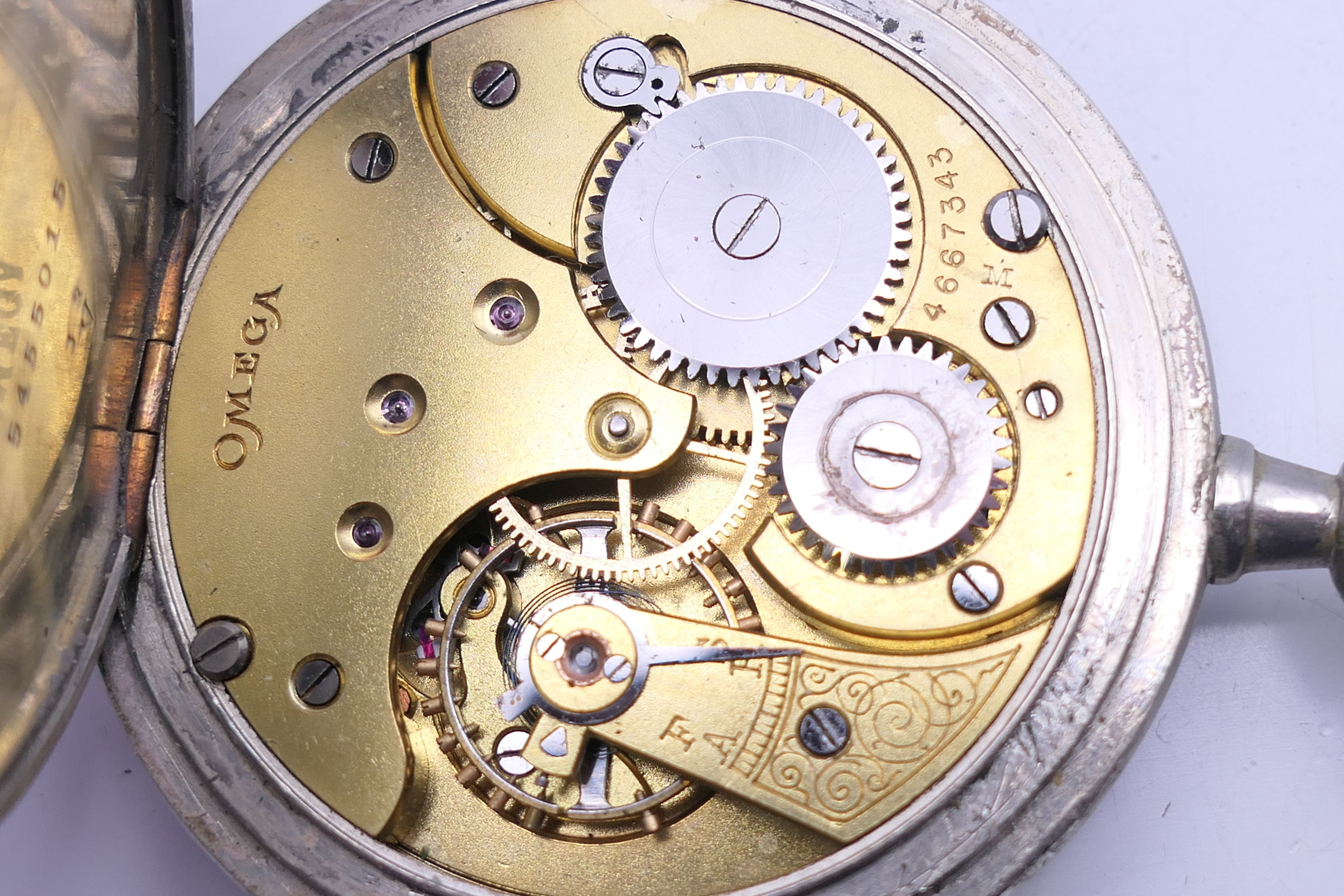 An Omega pocket watch, serial number 5455015. 4.5 cm diameter. - Image 6 of 7