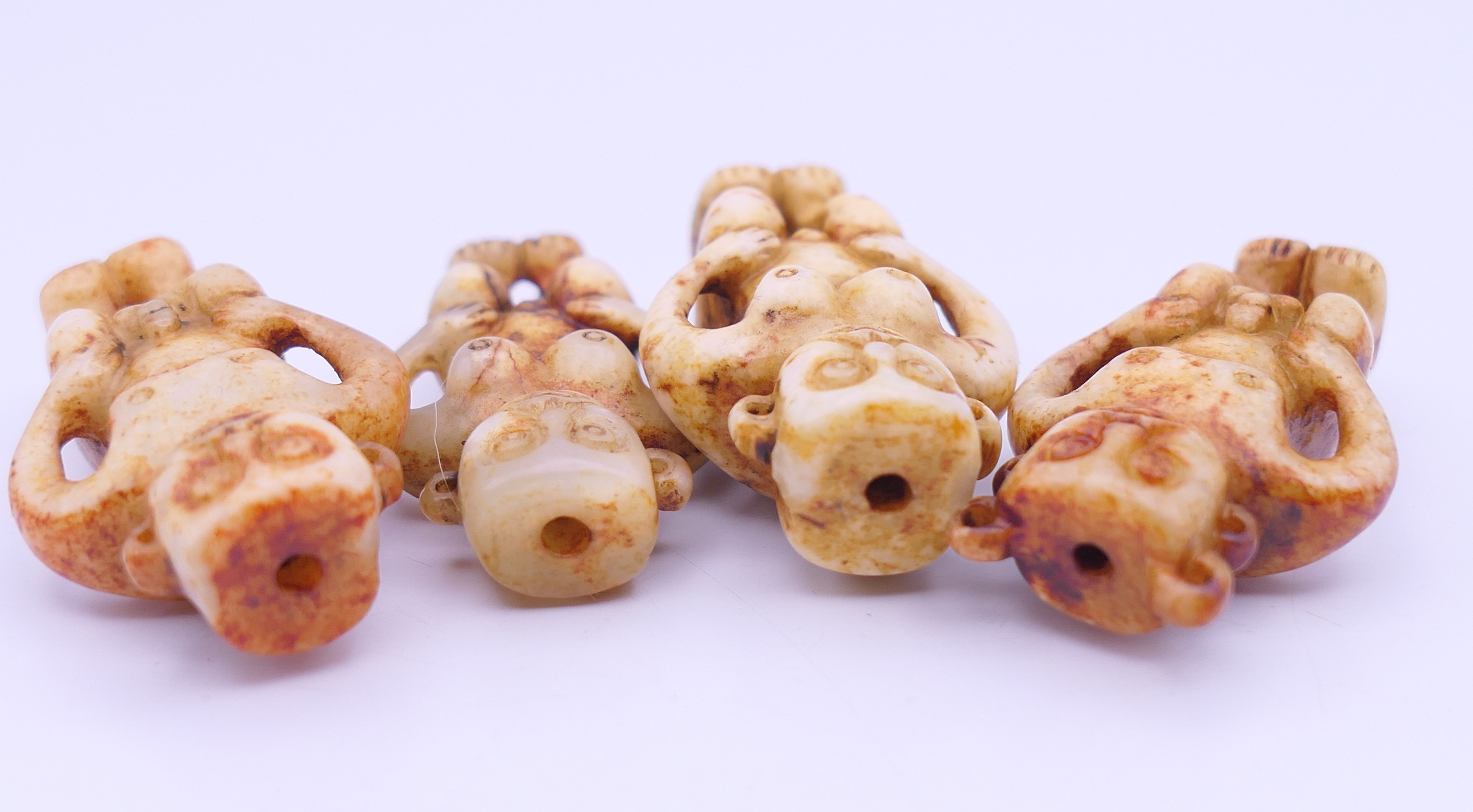 Nine Chinese fertility beads (seven male and two female), Han Dynasty. Each approximately 4 cm high. - Image 15 of 17