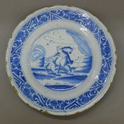A 19th century Delft plate. 22 cm diameter.