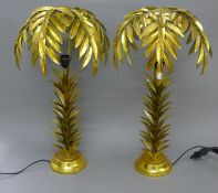 A pair of palm tree form lamps. 73 cm high.