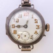 A gentleman's silver wristwatch. 3.5 cm wide.