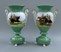 A pair of porcelain vases decorated hunt scenes. 39.5 cm high.