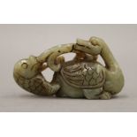 A jade duck and fish figure. 7 cm long.