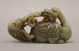 A jade duck and fish figure. 7 cm long.