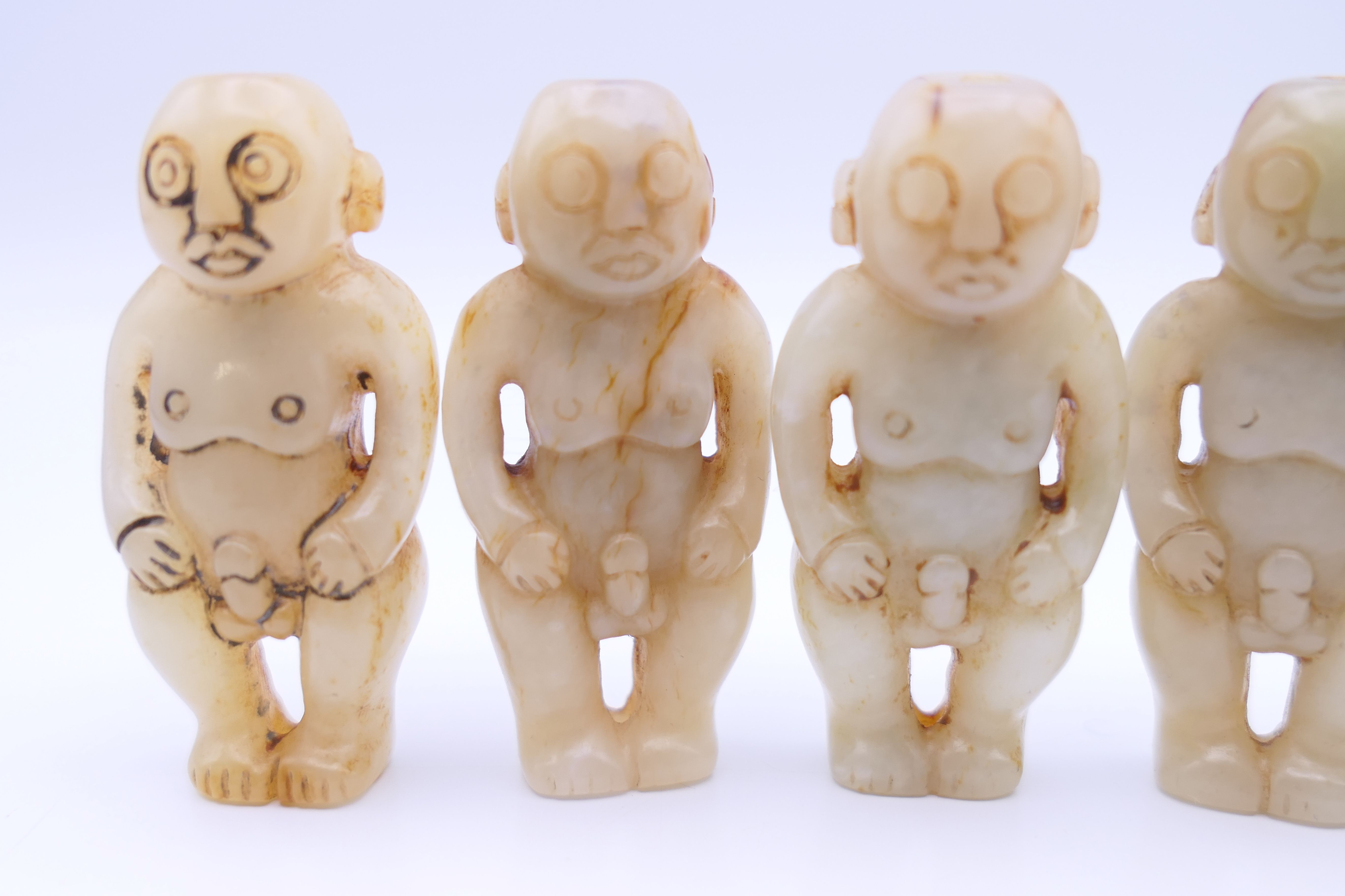 Nine Chinese fertility beads (seven male and two female), Han Dynasty. Each approximately 4 cm high. - Image 3 of 17