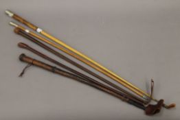 Five various crops and military swagger sticks. The largest 82 cm long.