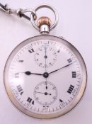 A 925 silver open face pocket watch with stop watch function. 5 cm diameter.