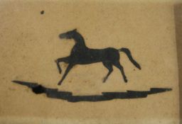 A 19th century silhouette of a horse, with inscription to reverse. 8.5 x 6 cm.