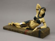 A resin model of Cleopatra. 36 cm long.