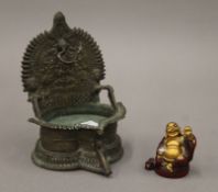 A Tibetan bronze shrine and a model of Buddha. The former 13 cm high.