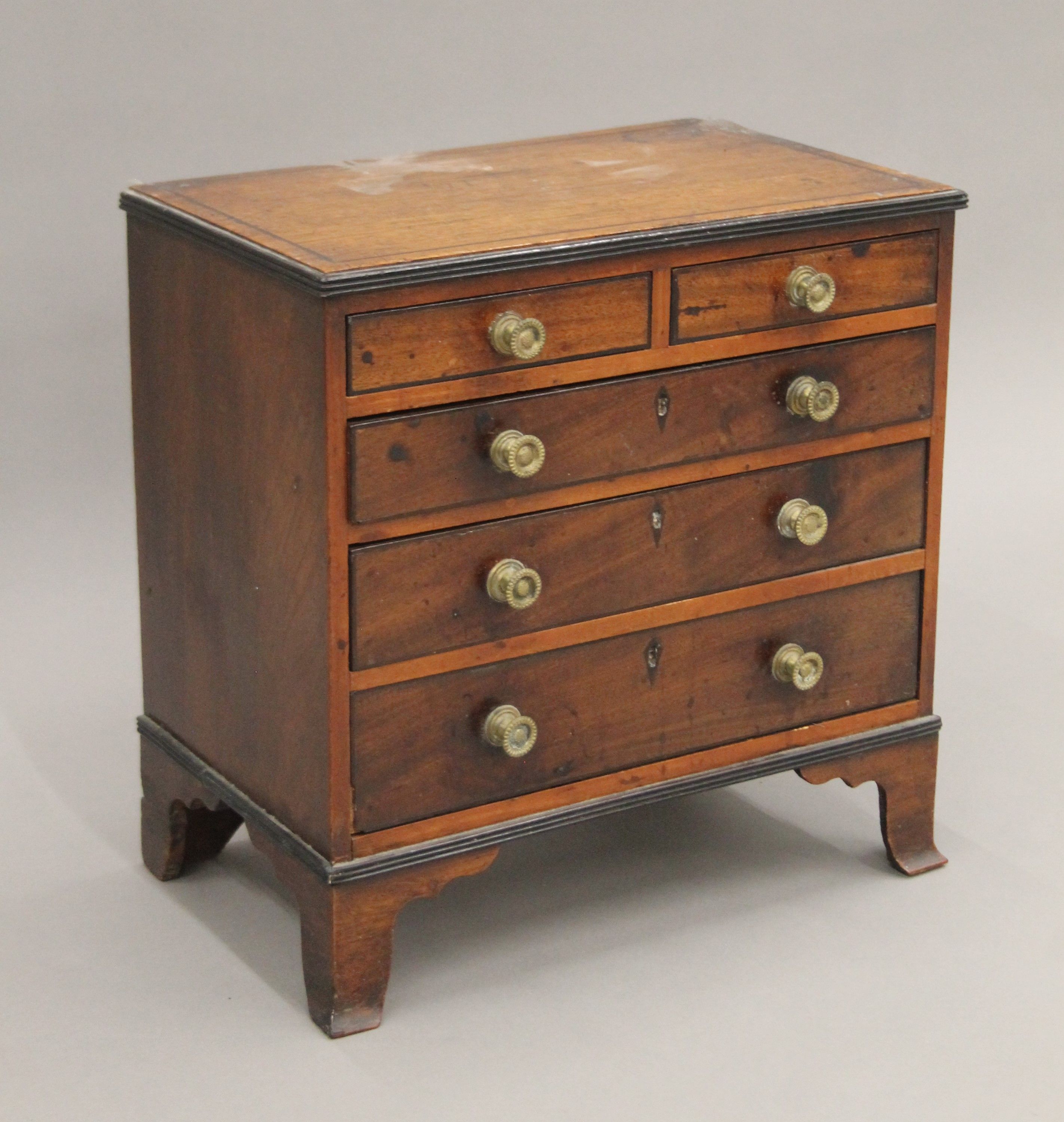 A 19th century mahogany miniature chest of drawers. 36.5 cm wide. - Image 2 of 6