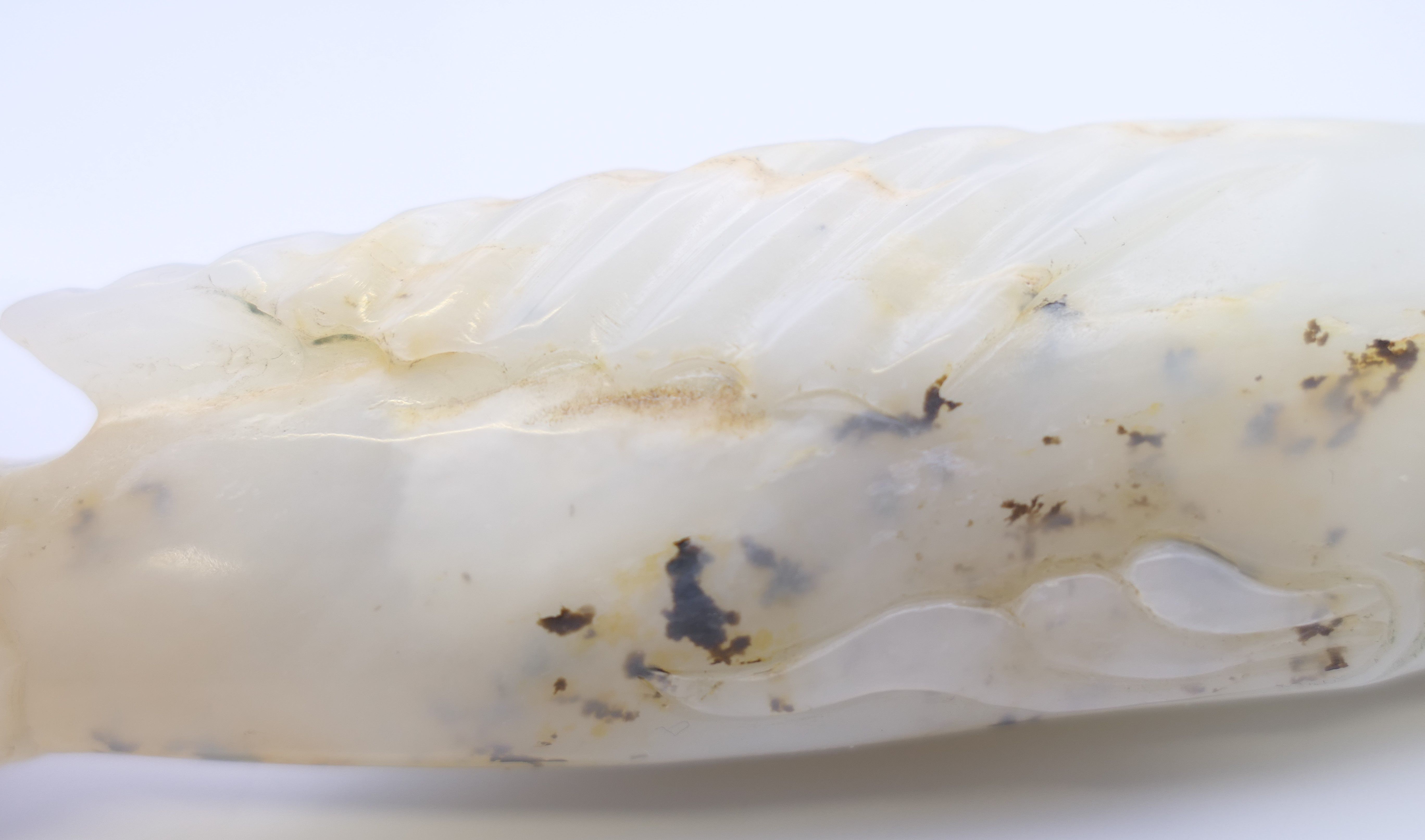 A small Chinese white jade fish, Yuan Dynasty. 12.5 cm long. - Image 7 of 8