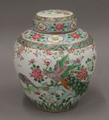 A 19th century Chinese famille rose ginger jar and cover. 21 cm high.