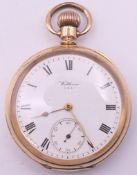 A rolled gold Waltham pocket watch. 4.75 cm diameter.