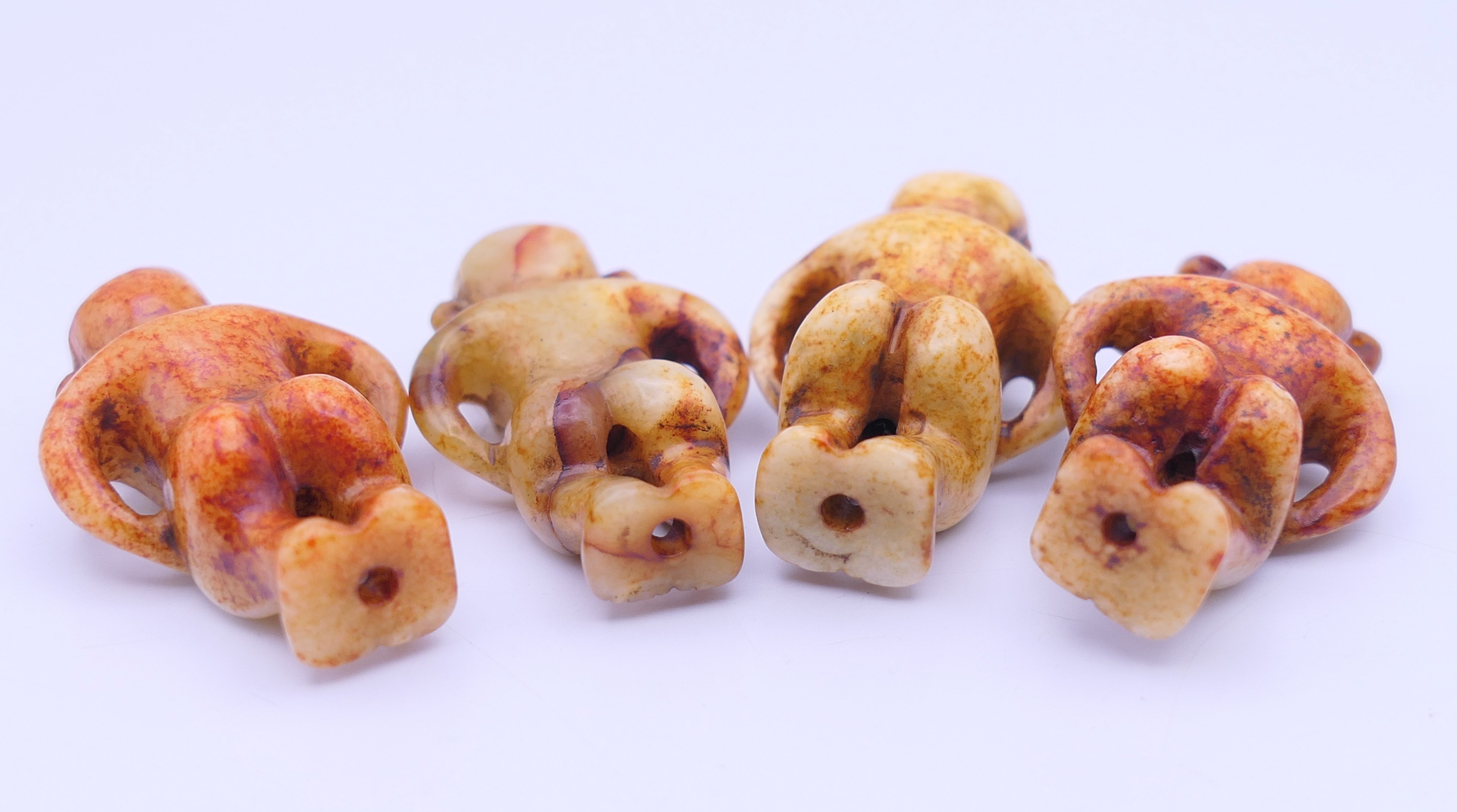 Nine Chinese fertility beads (seven male and two female), Han Dynasty. Each approximately 4 cm high. - Image 14 of 17