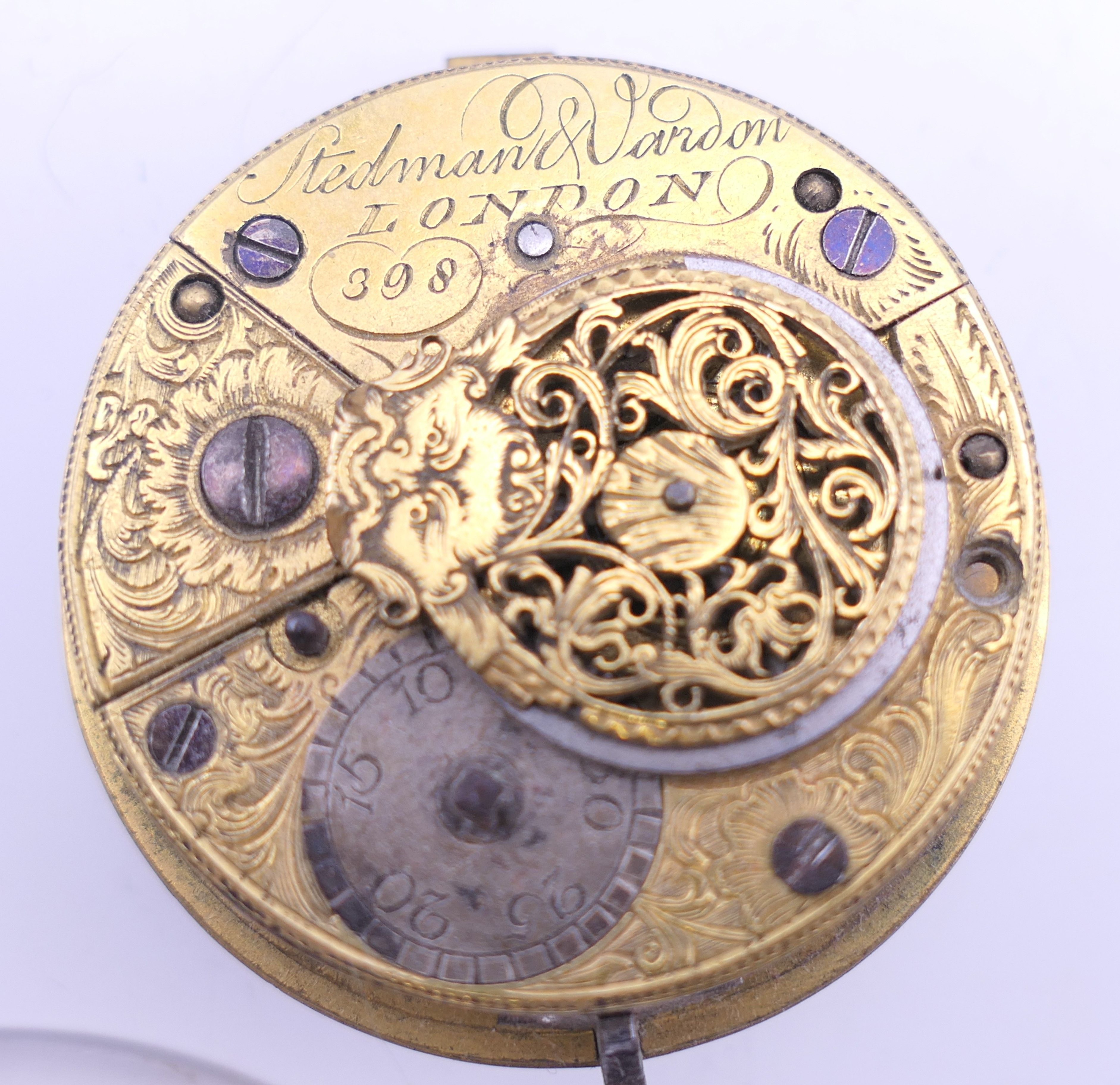 A small box of assorted pocket watch movements and faces. - Image 10 of 14