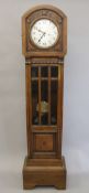 An early 20th century oak longcase clock. 179 cm high.