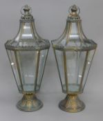 A pair of lanterns. 65 cm high.
