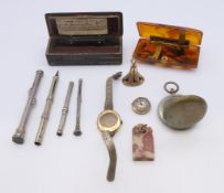 A quantity of various items, including propelling pencils, two small gold watches, etc.