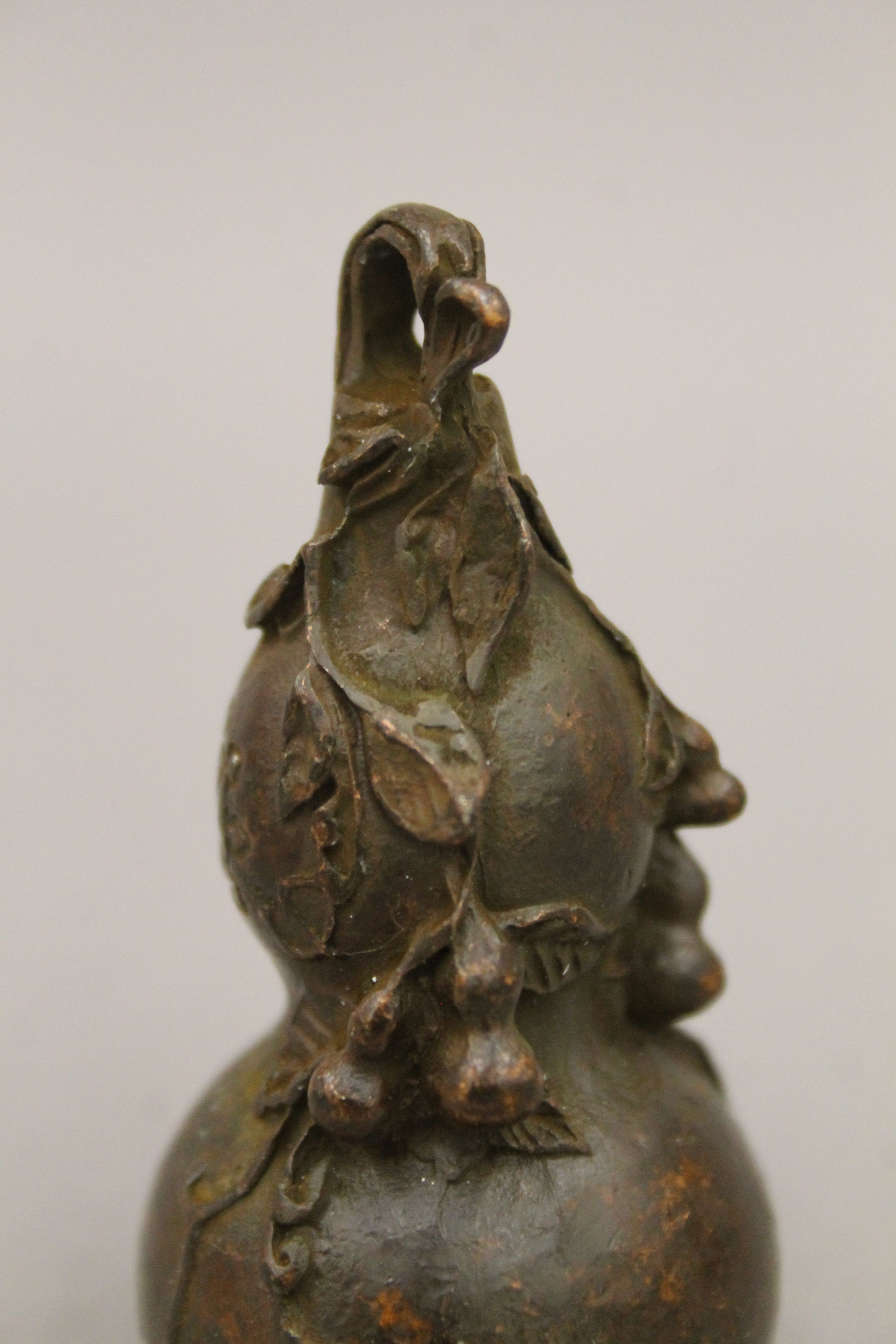 A bronze double gourd. 7 cm high. - Image 4 of 5