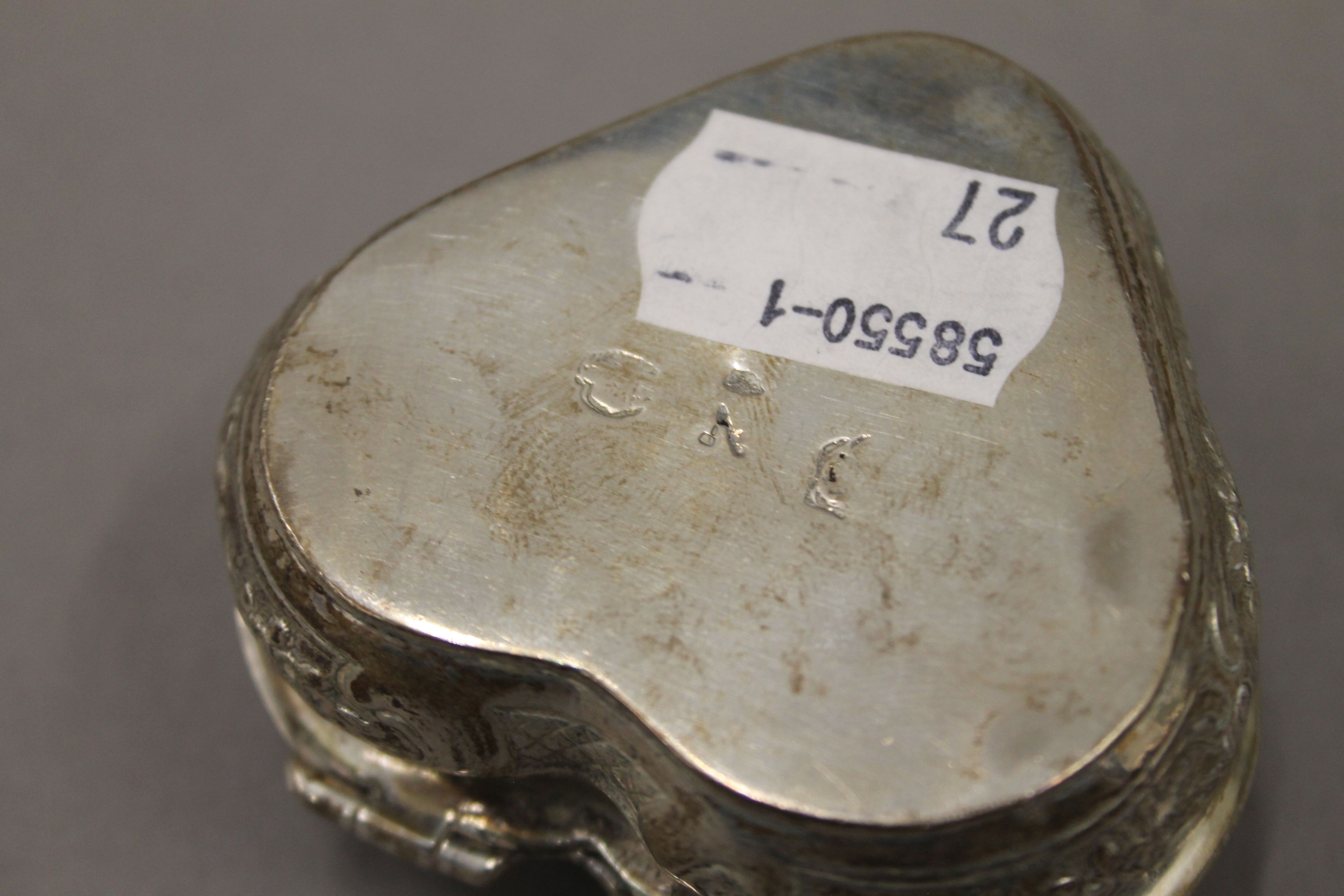 A Dutch silver heart shaped box, a small silver tray and a silver spoon. The former 6.5 cm wide. - Image 16 of 16