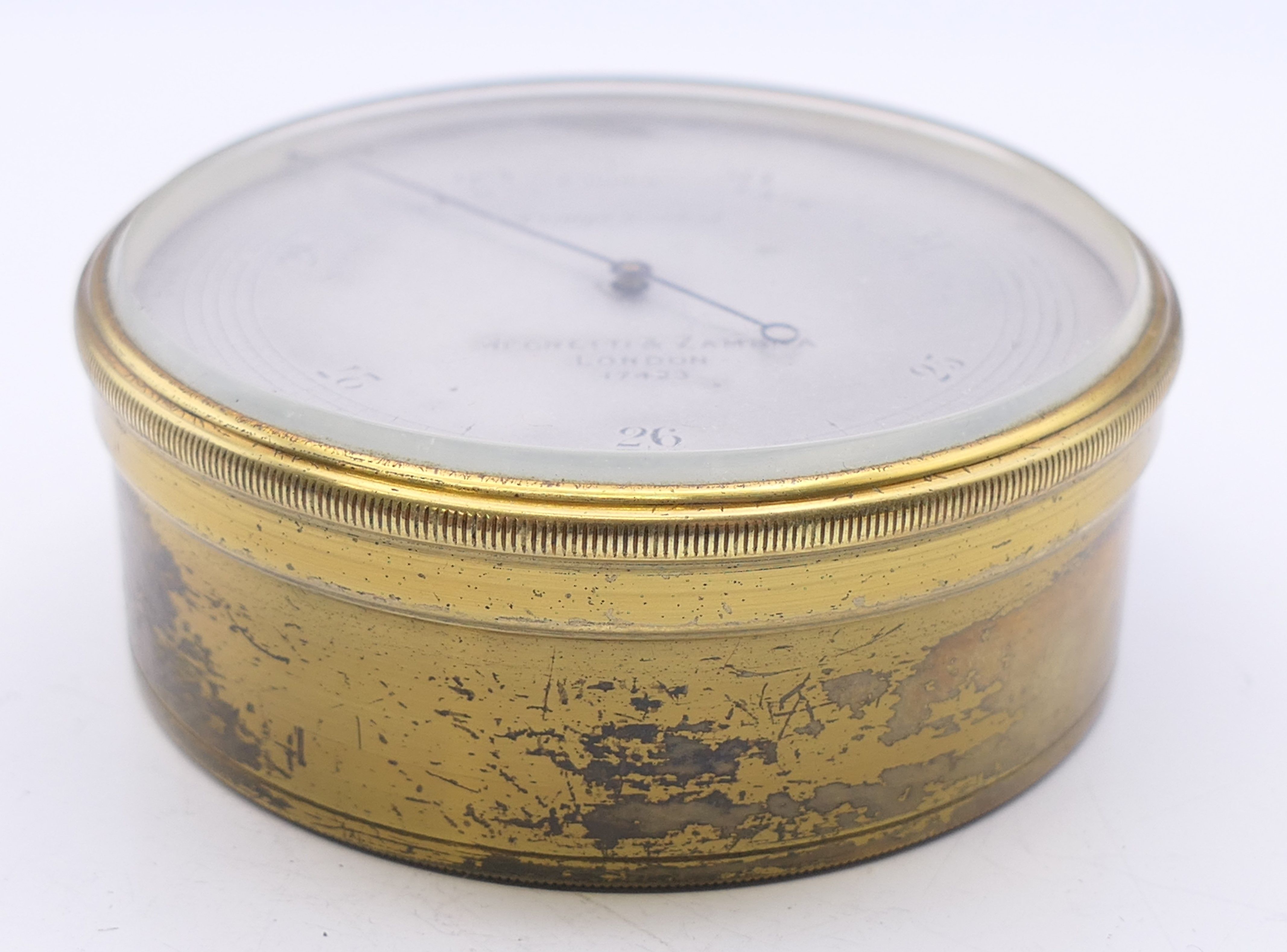 A Negretti & Zambra of London brass barometer, in original case, numbered 17423. 7 cm diameter. - Image 5 of 15