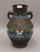 A late 19th century Chinese bronze champleve vase. 30 cm high.