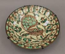 A 19th century Eastern splash ware dish. 34 cm diameter.