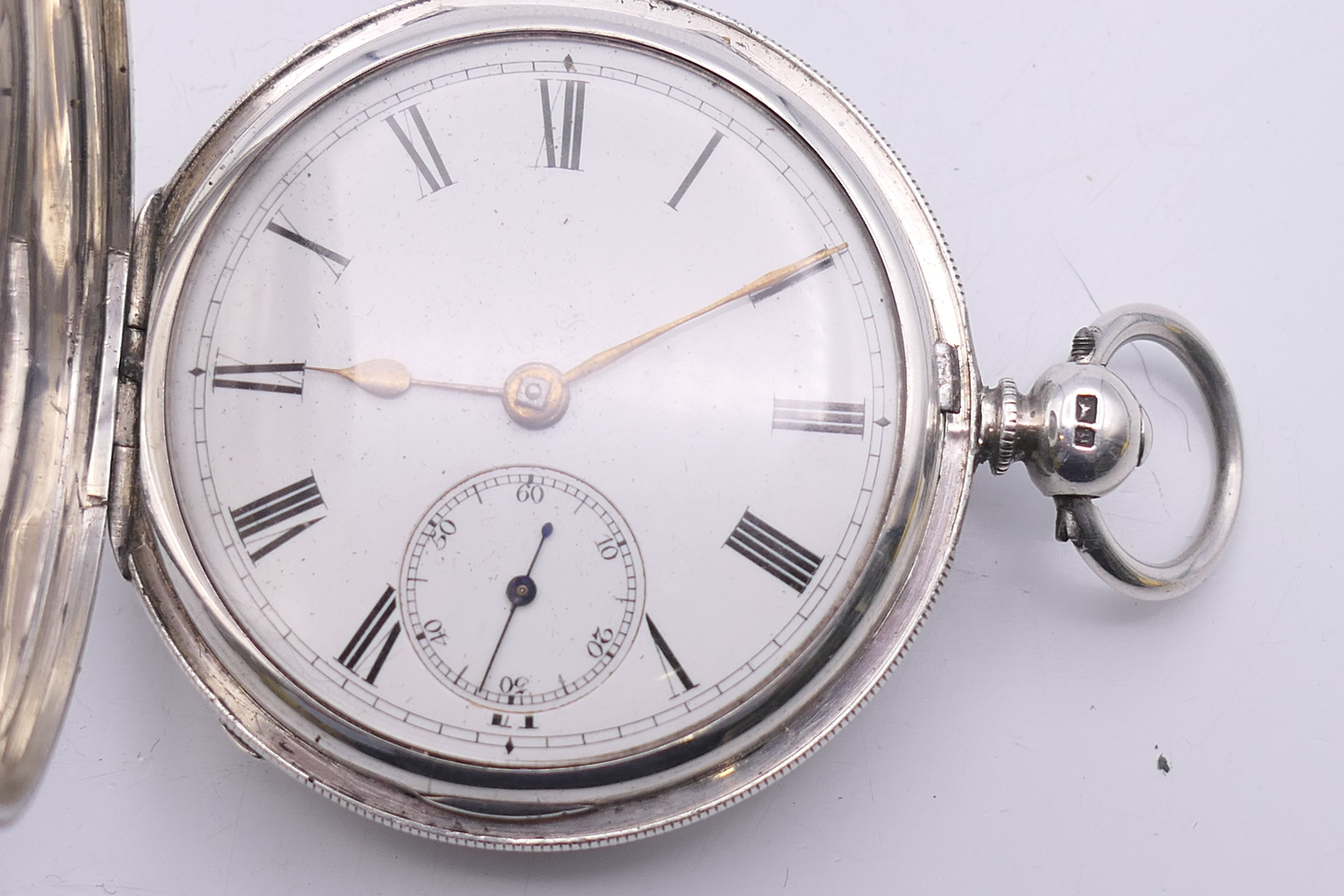 A silver full hunter pocket watch, hallmarked for London 1881. 5 cm diameter. - Image 4 of 9