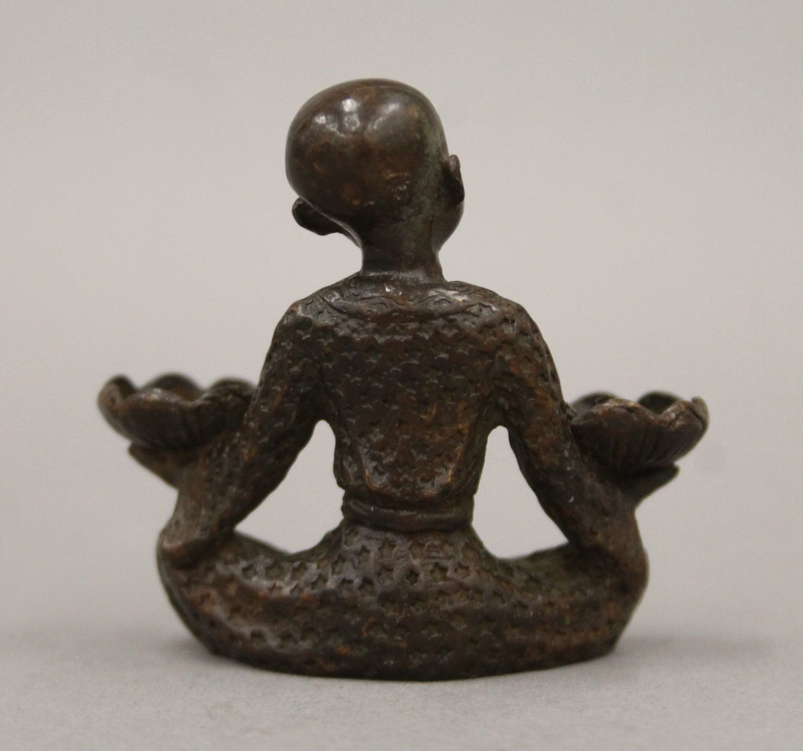 A bronze model of a boy with lilies. 5.5 cm high. - Image 5 of 6