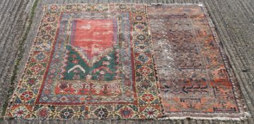 Two Caucasian wool rugs.