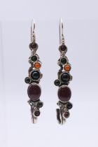 A pair of gem set unusual silver earrings marked PORAN. 6.5 cm high.