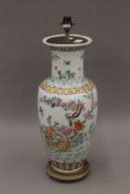 A vintage Chinese famille rose vase decorated with birds,