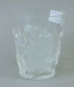 A Lalique France glass vase with oak leaf decoration. 11.5 cm high.