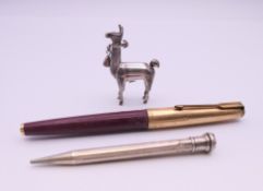 A silver figure of an alpaca and a silver propelling pencil. The former 5 cm high.