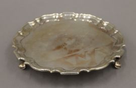 A Victorian silver salver, inscribed William Damers Ward 25th December 1852. 19.5 cm diameter.