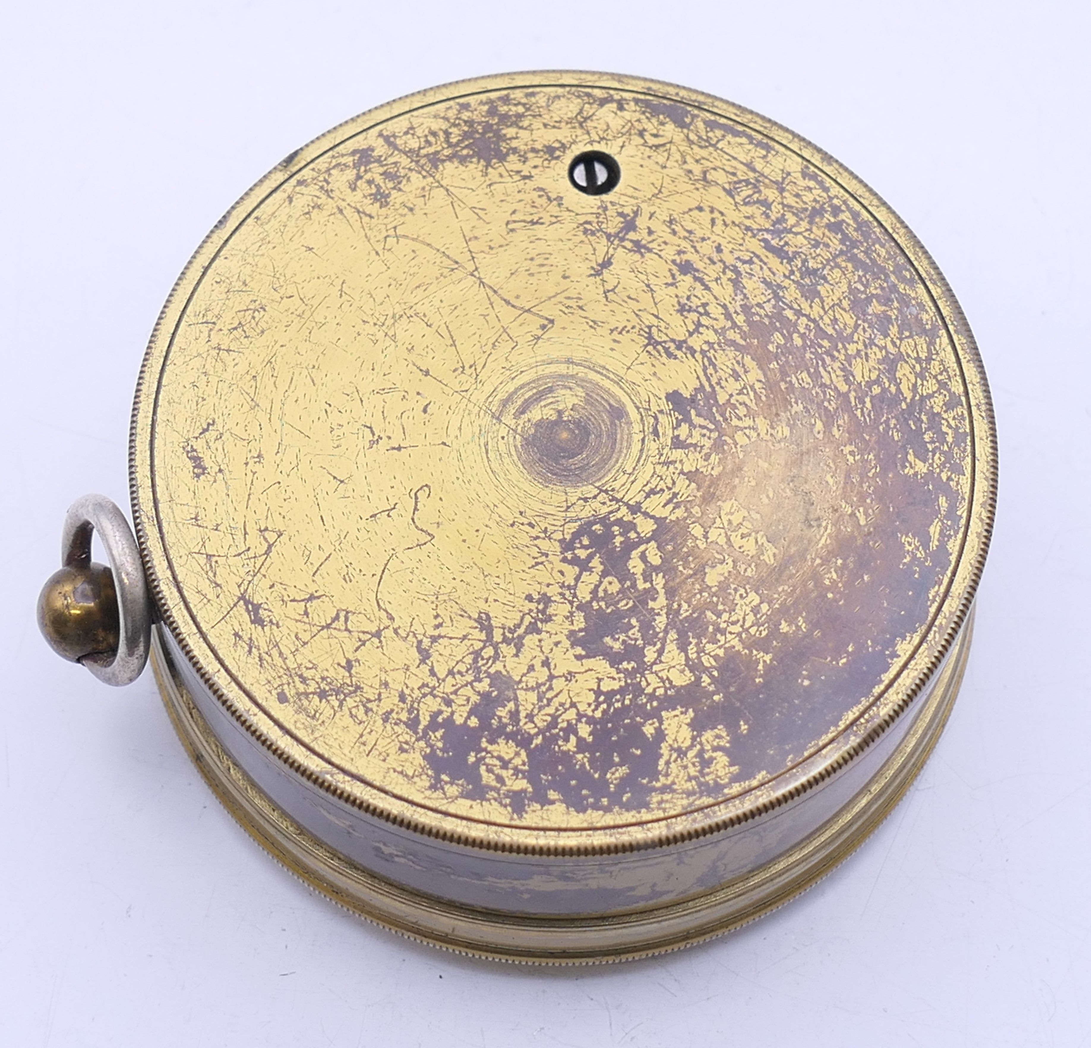 A Negretti & Zambra of London brass barometer, in original case, numbered 17423. 7 cm diameter. - Image 7 of 15