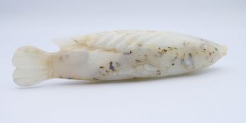 A small Chinese white jade fish, Yuan Dynasty. 12.5 cm long.