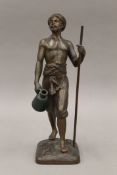 A 19th century patinated spelter model of a North African man. 30 cm high.