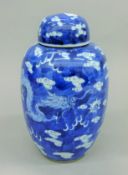 A 19th century Chinese porcelain jar and cover. 20.5 cm high.
