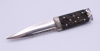 A silver, wood and amethyst cloak pin in the form of a Scottish dirk, hallmarks for London 1970.