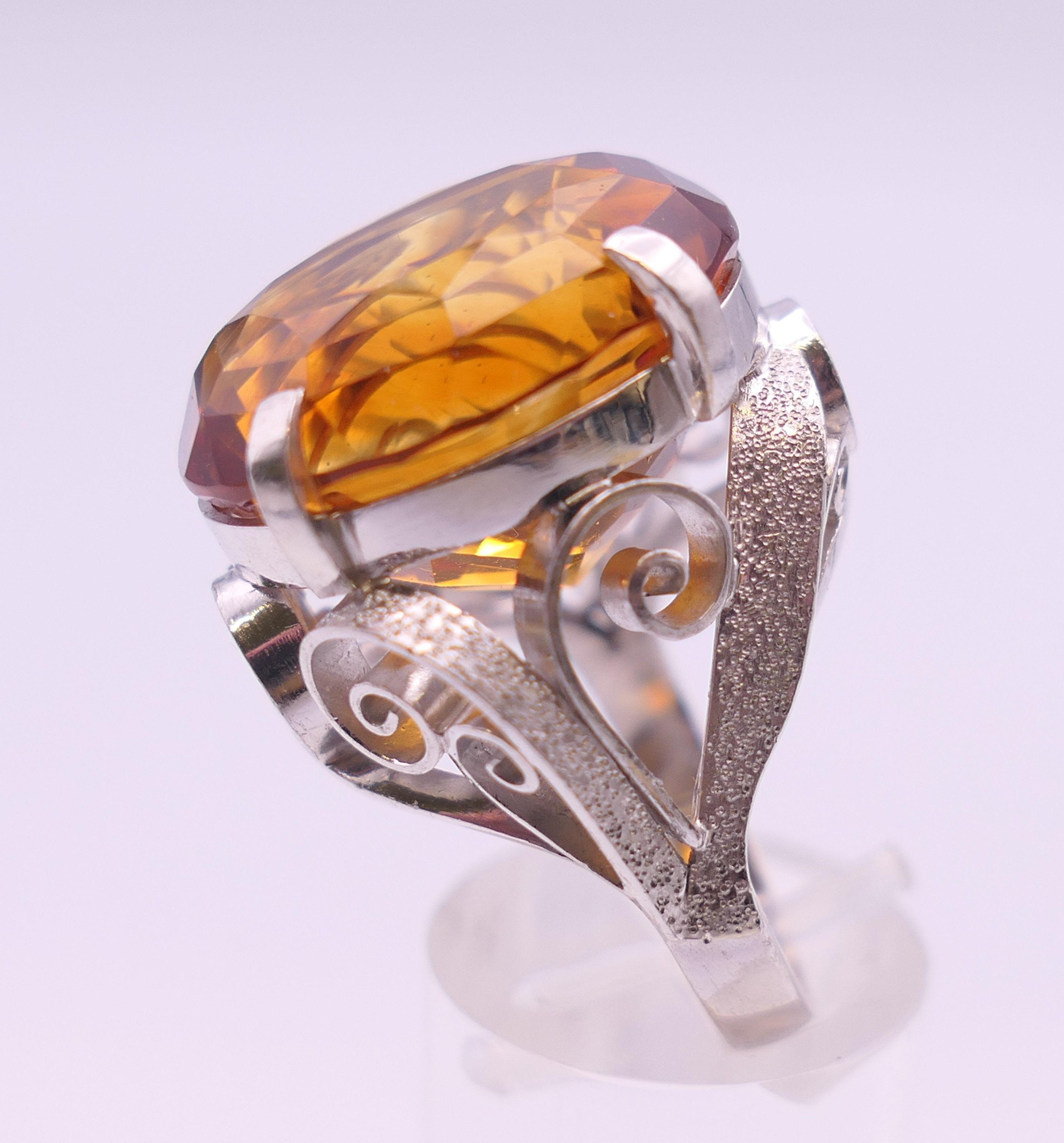 A platinum Madeira citrine ring. Citrine 2.5 cm x 1.5 cm. Ring size N/O. 20.8 grammes total weight. - Image 5 of 8