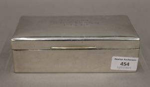 A silver cigarette box, the lid inscribed 'G.H. Flood from Vice Admiral Dudley Pound 4th Aug 1930'.