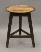 A mahogany cricket table. 48 cm diameter.