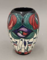 A Moorcroft vase. 17 cm high.