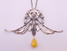 An Art Nouveau style pendant necklace. 10.5 cm wide.